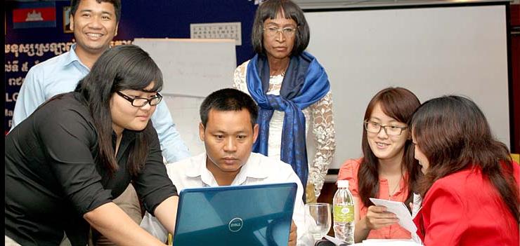 Transgender activist Sou Sotheavy, recent winner of the top Berlin Film Festival human rights award, and survivor of the Khmer Rouge regime, observes as conference participants draft legislation for equality in educational services.