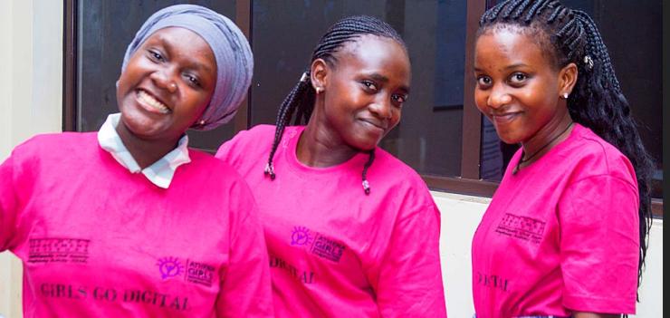 Young Lira residents developing the AGIC-BIZZ mobile applications that will link rural girls to online markets to sell products they produce locally