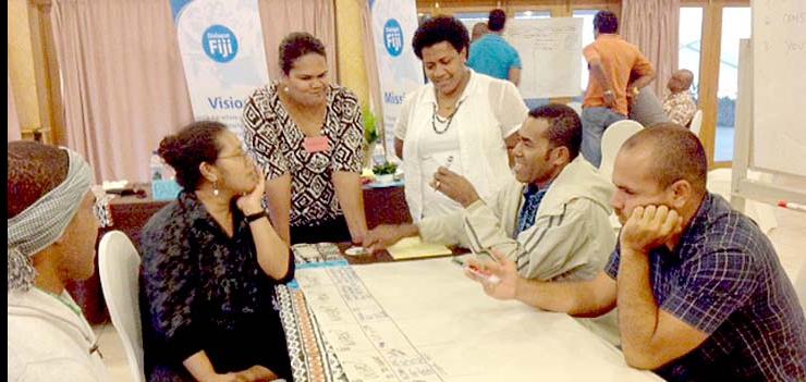 Sept 2013: Fijian mediators and facilitators participating in a group based activity on how to conducts dialogues.
