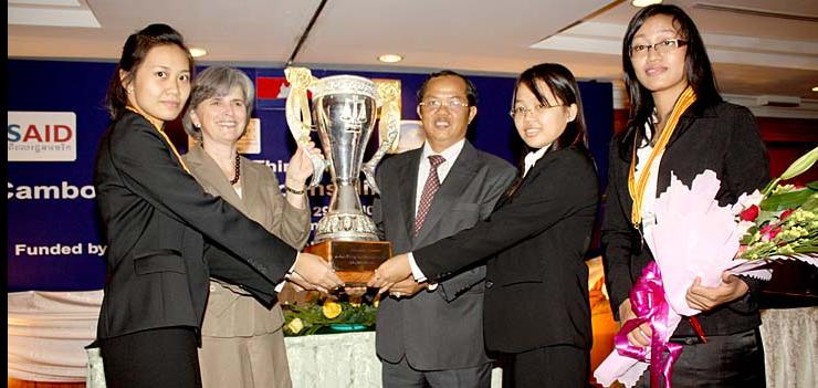 Winners of the Winners of the 2010 competition at a ceremony with the US Ambassador & President of Cambodia’s Bar Association.